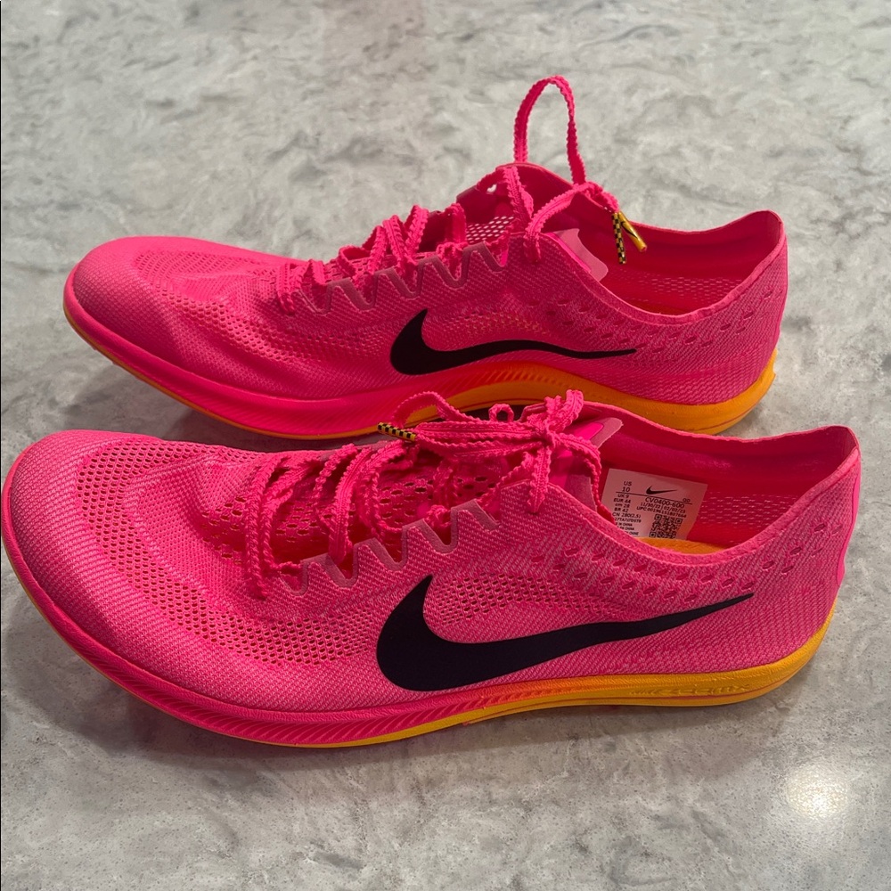 Nike woman’s  Pink and Yellow Athletic Shoes